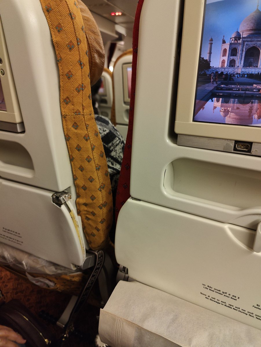 ArushiPhillips's tweet photo. Despite the merger @airindia is the worst airline ever! Broken tables and most uncomfortable seats!! https://t.co/kp2cBS6fcy