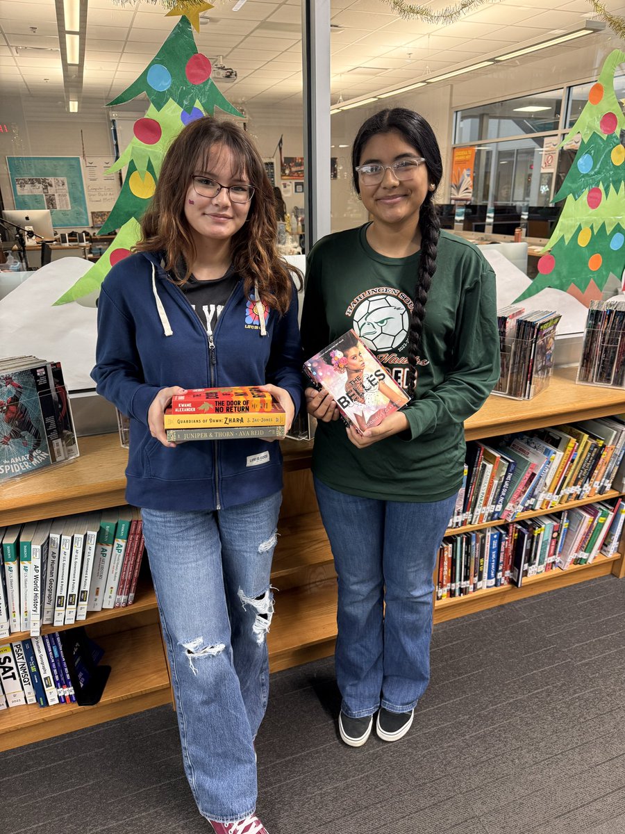 Congrats to Mia S. and America M. for winning the Reindeer Bookmark raffle! They went home with a book bundle ready for Christmas break! #hshpilc #bookmark