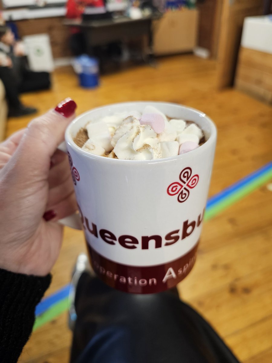 MrsPHT's tweet photo. Den Building club invited me for festive hot chocolate in their den!A group of students, meet on Monday after school &amp; have worked together to build this amazing construction!They'd really like to build a hen house next.I think they'll expect hens as well!🫣 @QueensburyAcad https://t.co/5uVAsjIN48