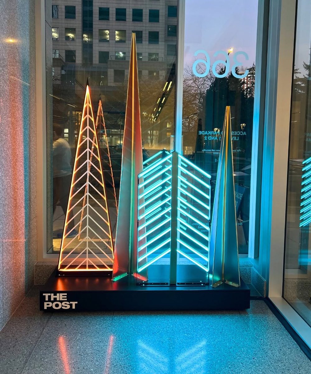 mossled's tweet photo. Studio Artefact created a contemporary holiday installation at The Post in Vancouver, featuring Moss LED neon products, which were used to illuminate the Christmas trees and hanging ornaments. Vibrant neon brings a festive glow to the space, blending artistry with lighting tech. https://t.co/2f4cw8DXhB