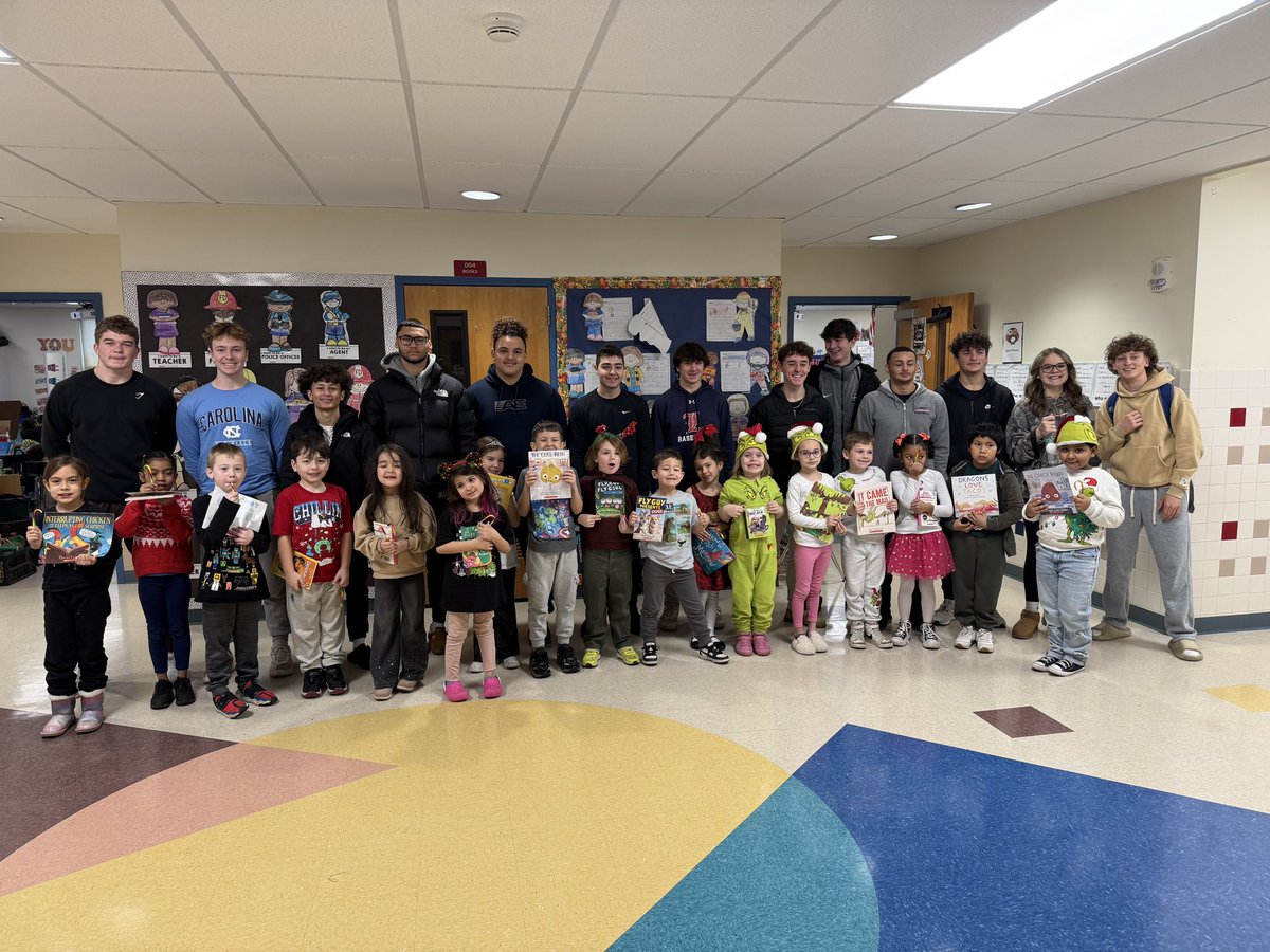 Calypso1stGrade's tweet photo. LHS Football team came to Calypso to read to our first graders. The children were so excited to listen to their brand new RIF books they received. Thank you UGI and Reading is Fundamental for the awesome books!  @AtilZilvia  @RIFGivingPage @BethlehemAreaSD https://t.co/90YtN3p4w8