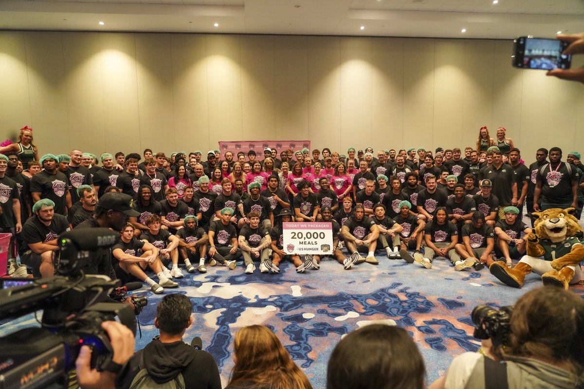 .<a href="/OhioFootball/">Ohio Football</a> at the <a href="/CureBowl/">StaffDNA Cure Bowl</a>  charity event this afternoon

Ohio players helped pack 20,000 meals for U.S. Hunger