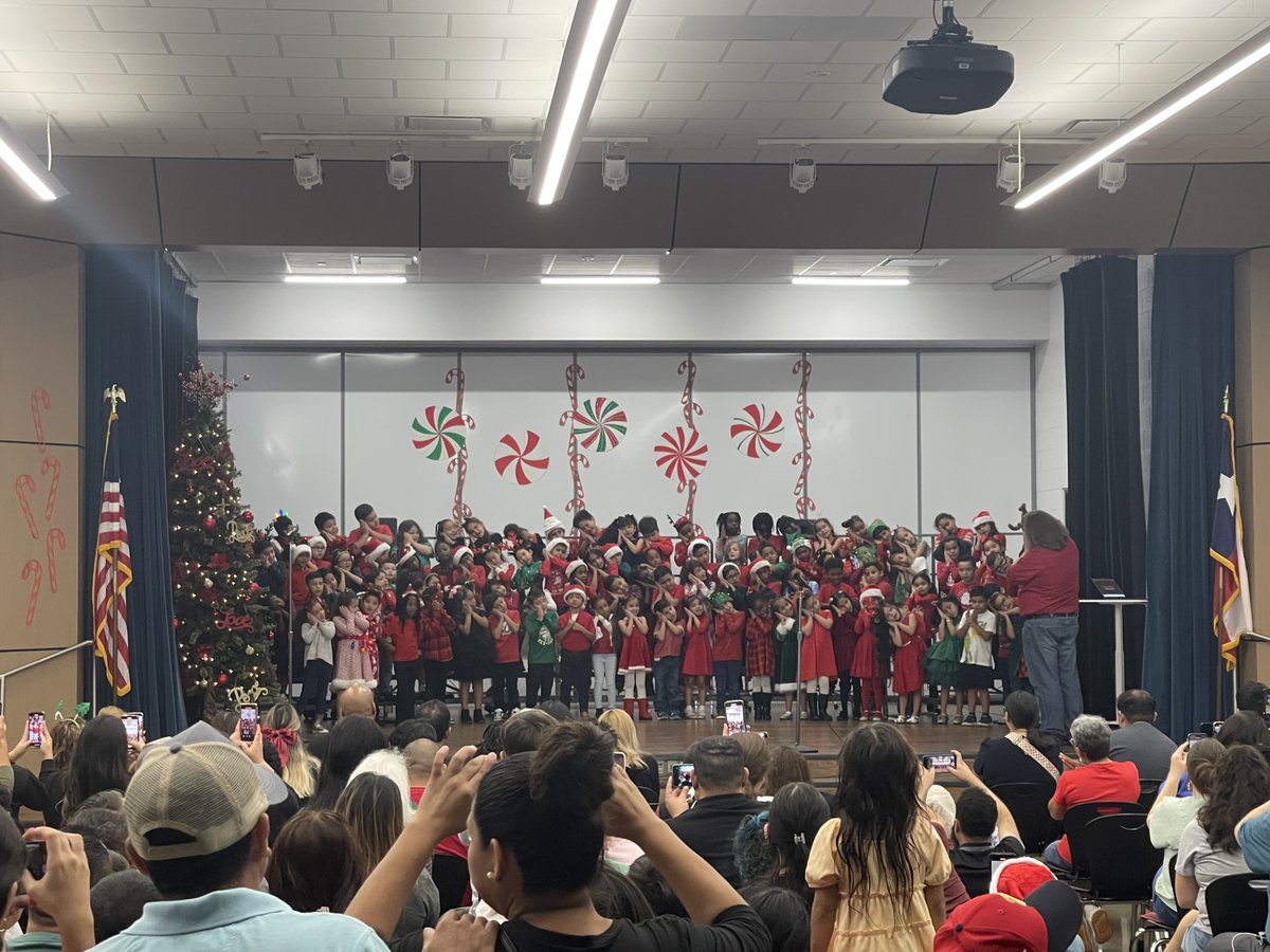HooverCFISD's tweet photo. It was standing room only at our 1st-grade winter concert this week. Our Heroes did an amazing job singing and ringing in the holiday season! A BIG thank you to Mr. Keen for his hard work with our students! #BeAHooverHero #pathtoamazing https://t.co/Xti3Cx6SE9