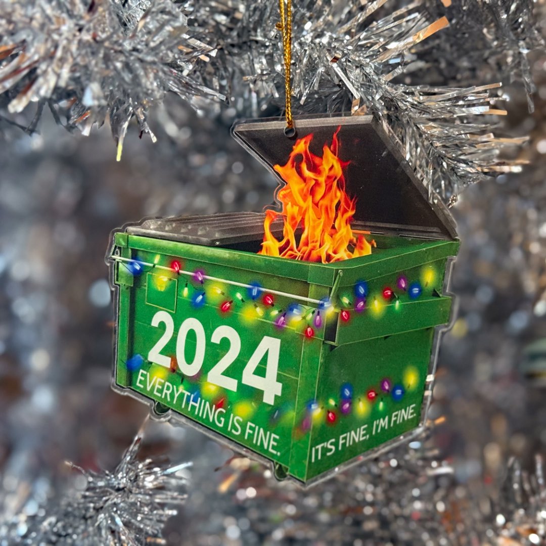 stevenshomler's tweet photo. Hanging on Our Tree Right Now! 
 
2024 has been a very, very tough year for my wife (KC Shomler) and I. 

Between the two of us we sometimes make darker jokes and when I saw this Christmas tree ornament, I knew that it would bring a smile to her face. 
 
#2024DumpsterFire https://t.co/2ws9ASJIFF