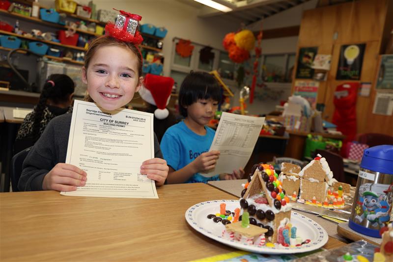 CityofSurrey's tweet photo. The City's Building Division met with a hardworking group of builders and issued permits to some very creative gingerbread houses on Candy Cane Lane! 

Every year, a team from the Building Division has worked with a local school to bring a bit of fun to their school projects. https://t.co/c9gBUdenvu
