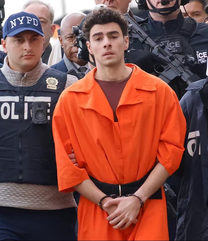 That was one big performance by the NYPD and it backfired spectacularly. Their goal was to make Luigi Mangione look like a Batman villain. Instead it made him look like a folk hero who fought back against the system that puts profits over our own lives.