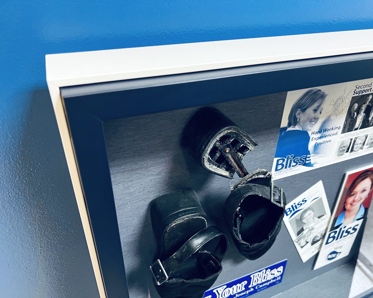FramesUnlimited's tweet photo. Follow your #Bliss, #FrameFridays! Our team framed this gift for #RosalynnBliss, the Mayor of #GrandRapids. The team encased Bliss's worn shoes and documents in a stacked #shadowbox frame, with a  liner and museum glass! The piece serves as a tribute to Bliss’s hard work! https://t.co/Dzv1tXhC9I