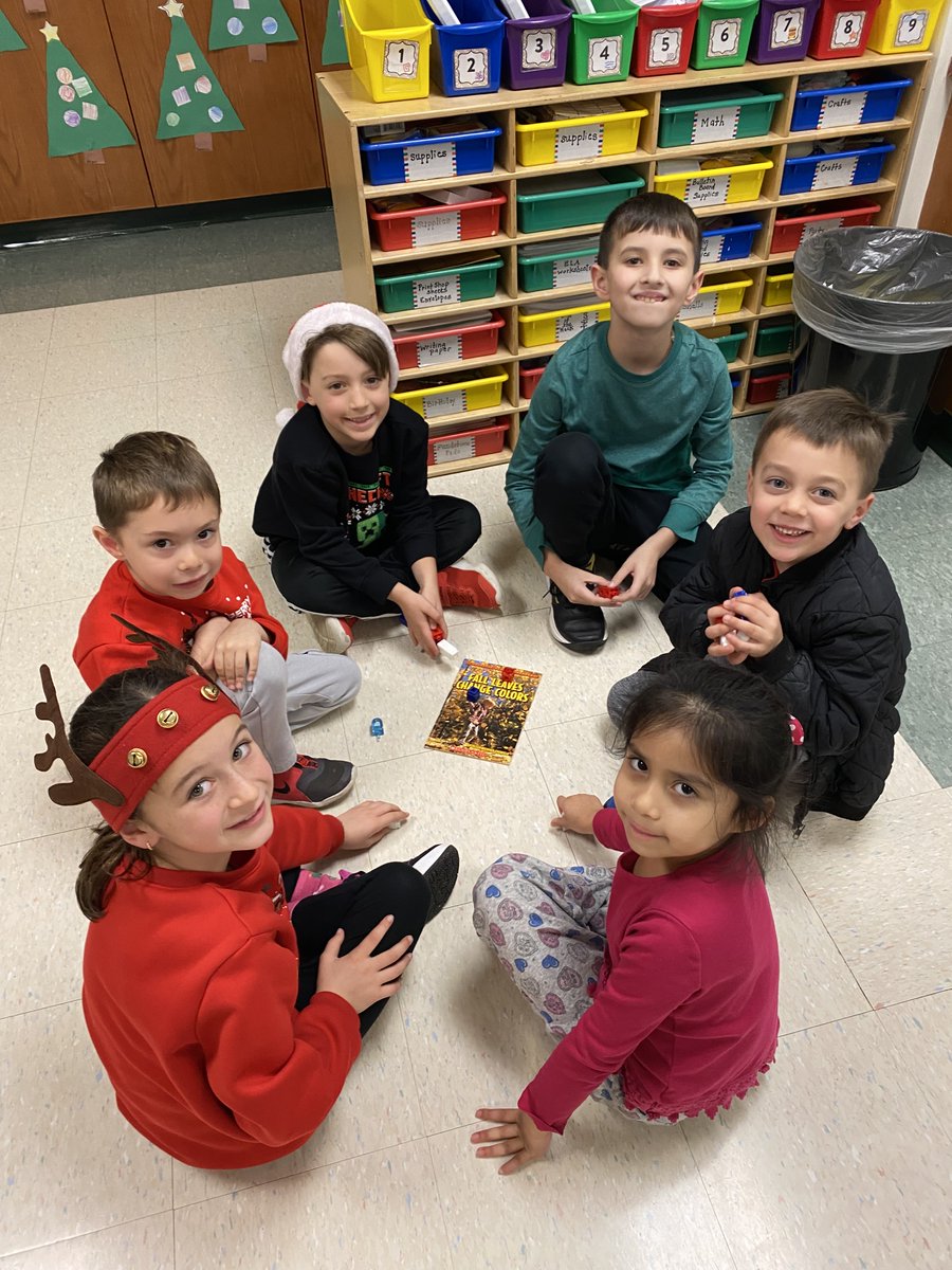 Today Ms. Mahler's 2nd graders had a visit with Ms. Febbraro's Kindergarten students to play a holiday game together!  Our older students showed our younger students how to play the Dreidel game.