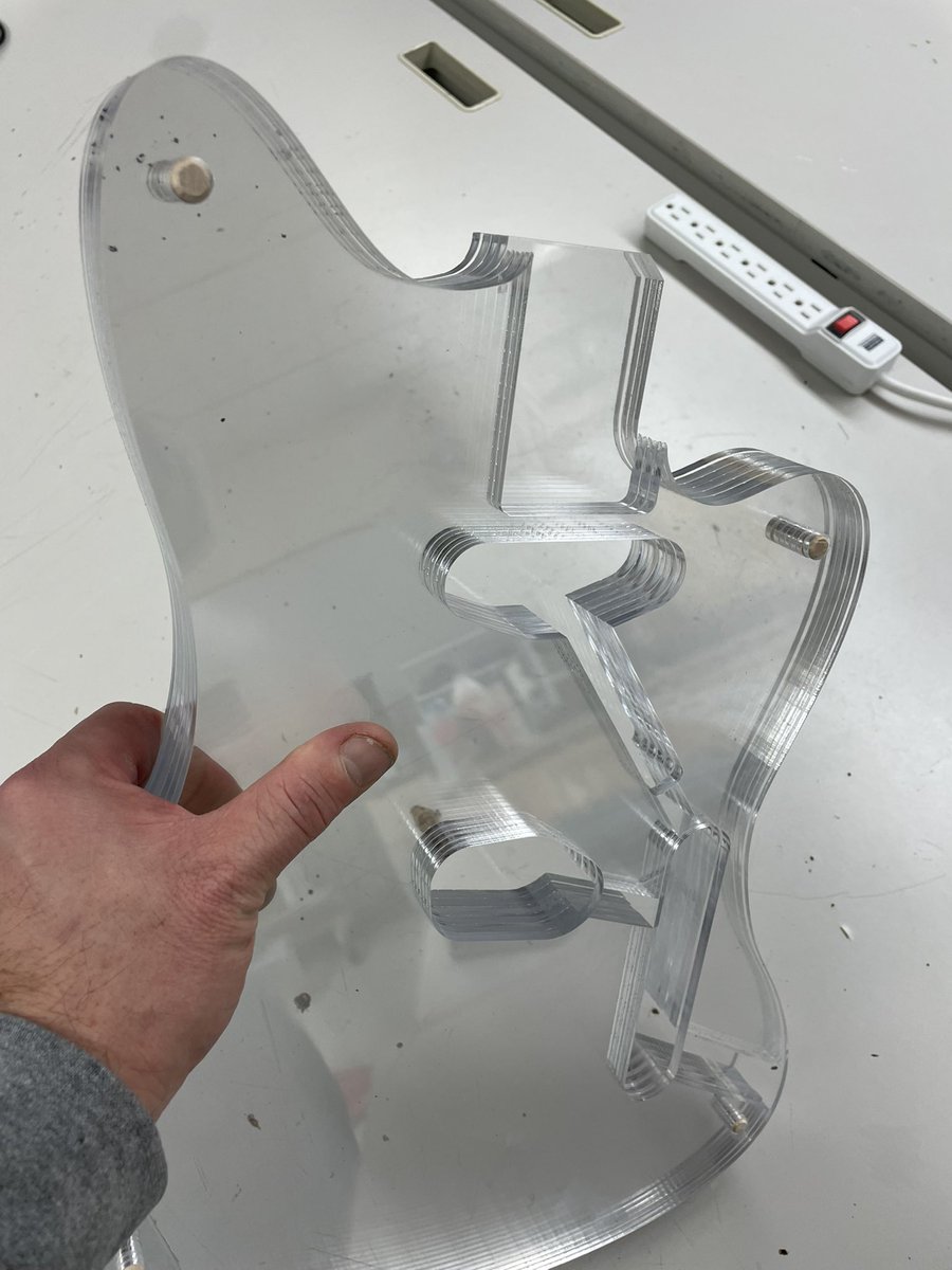 We made a laser-cut layered CLEAR electric guitar body! CADD class. This thing will turn heads. I haven’t seen anything else like it! Will be finished and wired up real soon! #achs #CAD #STEM #STEMeducation #cte #sequoits #laser #guitar #music #band