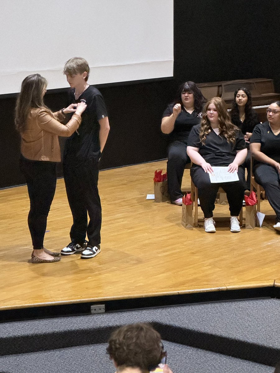 ashuping05's tweet photo. FHS Nursing Fundamentals had their pinning ceremony this week. All the students earned their nurse aide credential. #AllinBCPS #ignitelearningBCPS #CTEforNC https://t.co/Hq2A2U1p9c