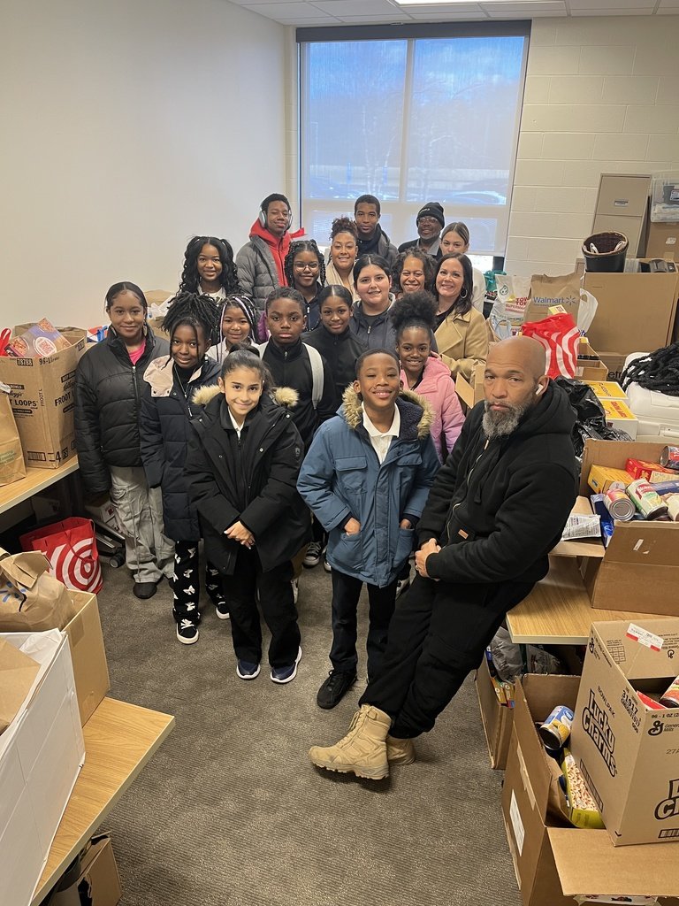 BloomfieldPS's tweet photo. Students from across the district supported the Bloomfield Food Bank located at Leisure Services as part of the 3rd Annual Stuff the Bus Food Drive. Students from Carmen Arace Intermediate School, Carmen Arace Middle School, and Bloomfield High School helped to unload the bus. https://t.co/oBBiWz4Jqp