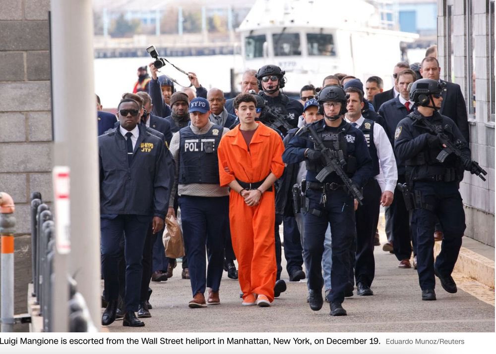 lukeisamazing's tweet photo. if there’s one thing I know, it’s that perp walking Luigi with the same number of armed guards they’d use to detain Superman in a movie will in no way cause his infamy and heroic status to grow exponentially https://t.co/5M857Wsdc6