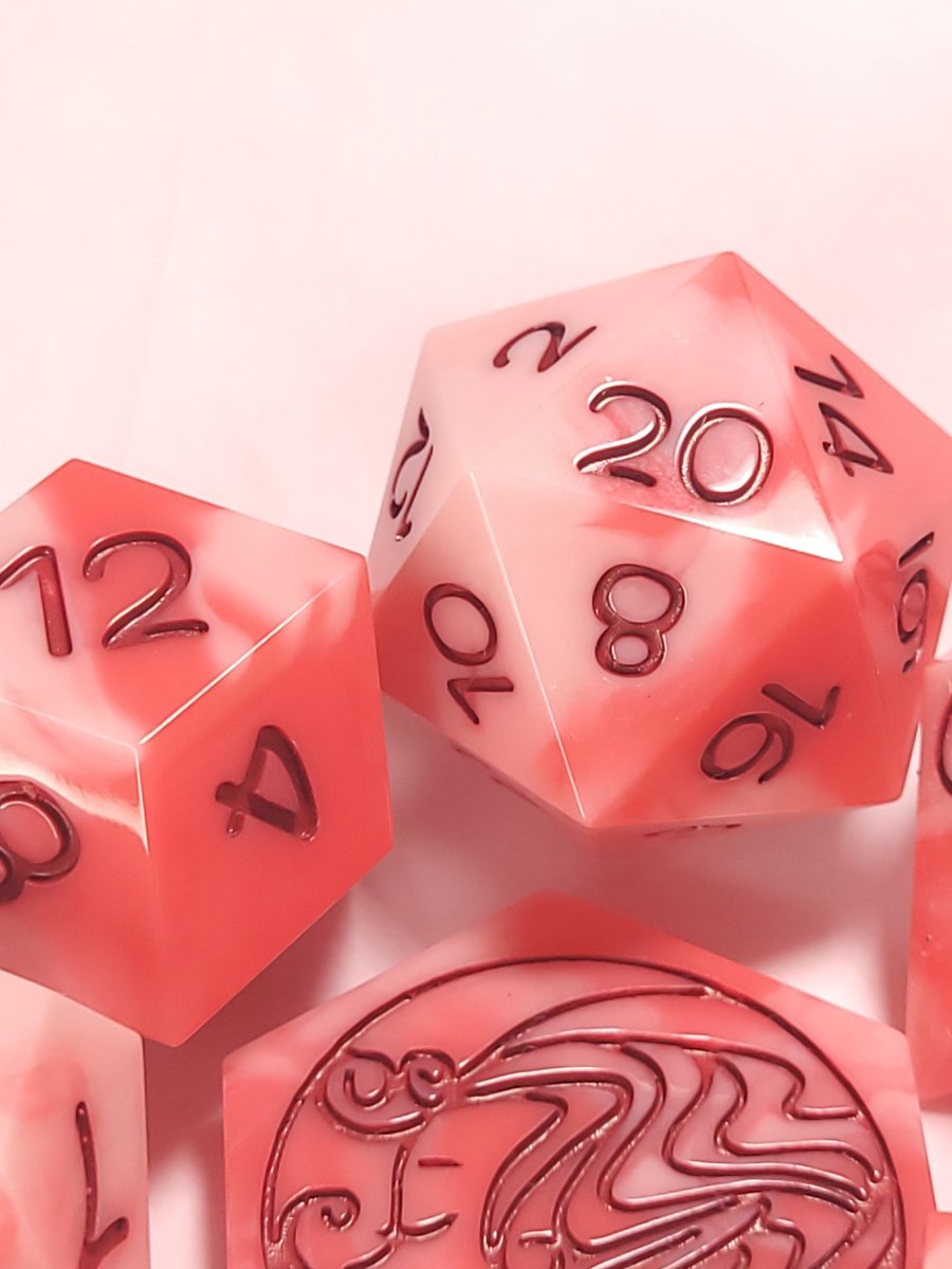 FlutesCreations's tweet photo. Red Marble is a swirling marble of white, a pinkyshade and red. inked in a deep red. 

#handmadedice #dice #flutescreations #ttrpgdice #dnd https://t.co/6Yk1haFkEK