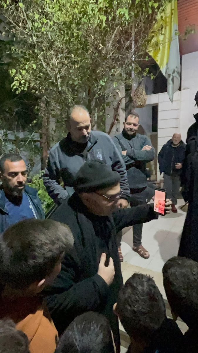 A picture of displaced Christians in Gaza at The Holy Family Catholic church speaking to <a href="/Pontifex/">Pope Leo XIV</a> via video call. It is worth mentioning that the pope calls the priest in Gaza almost daily to check on the Palestinian Christians there