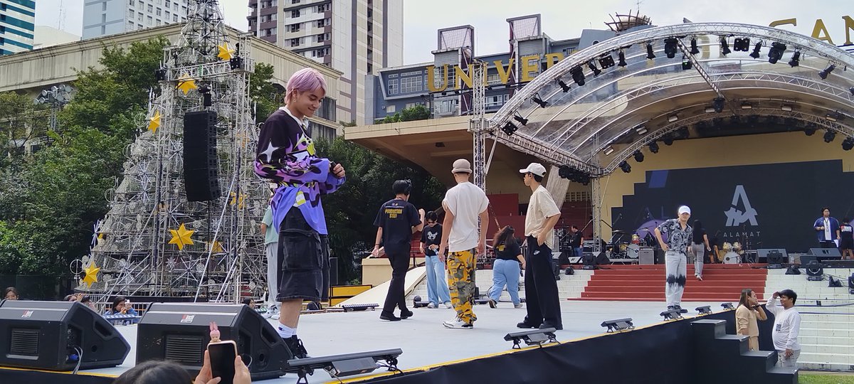 AS_theflame's tweet photo. P-pop group Alamat conducts a sound check at the UST Grandstand in preparation for later's Paskuhan concert. | @abtheflame 

#AbTheFlame https://t.co/PnX3OD3ewh