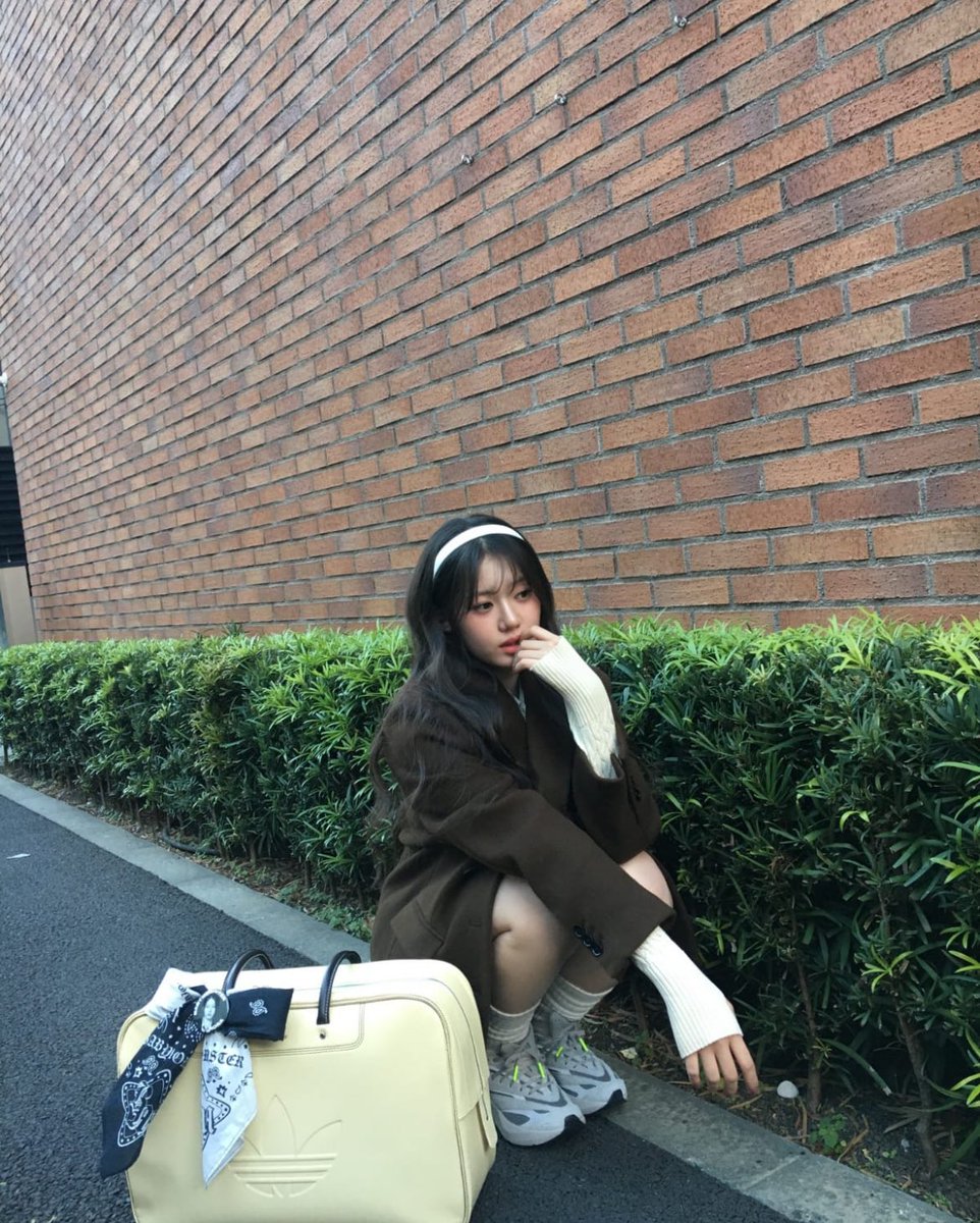 A quiet moment, unseen yet serene.
Carrying dreams in a bag by my side,
The world awaits, but I take my time to decide.