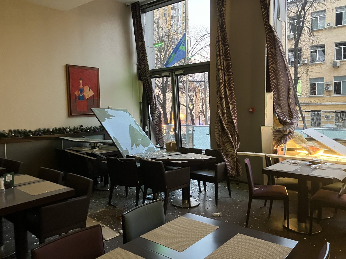 SanjayDani's tweet photo. POV Christmas mood in Kyiv:
Evening: Happily savoring Ukrainian borsch by a beautiful hotel window. 🥘
Morning: Tip-toeing through glass-strewn lobby, watching horror unfold through same window. 💔
#KyivLife #UkraineReality https://t.co/q83KgOY9fH