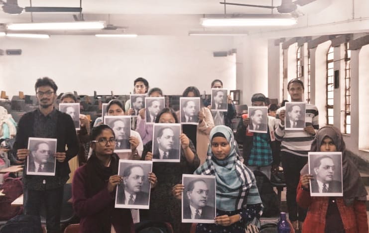 MayukhDuke's tweet photo. Dr. B.R. Ambedkar across the classrooms of Calcutta University!This protest was organised by SFI.

The entire country has taken stand against the Union Home Minister's derogatory comment.
RSS wants to destroy constitution implementing Manuwad.
Time to resist.
#AmbedkarInClassroom https://t.co/V8zdLH0J0r