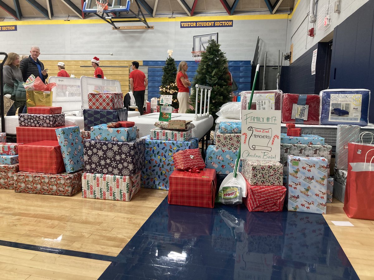 cmolewis7's tweet photo. Our Senior Class raised almost 50K worth of gifts for their Xmas Basket Project. The Regina community came together to purchase gifts for 18 impoverished families. A gym full of gifts ranging from clothes and toys to basketball hoops and beds is an amazing sight to see! https://t.co/xbbFhmdw27
