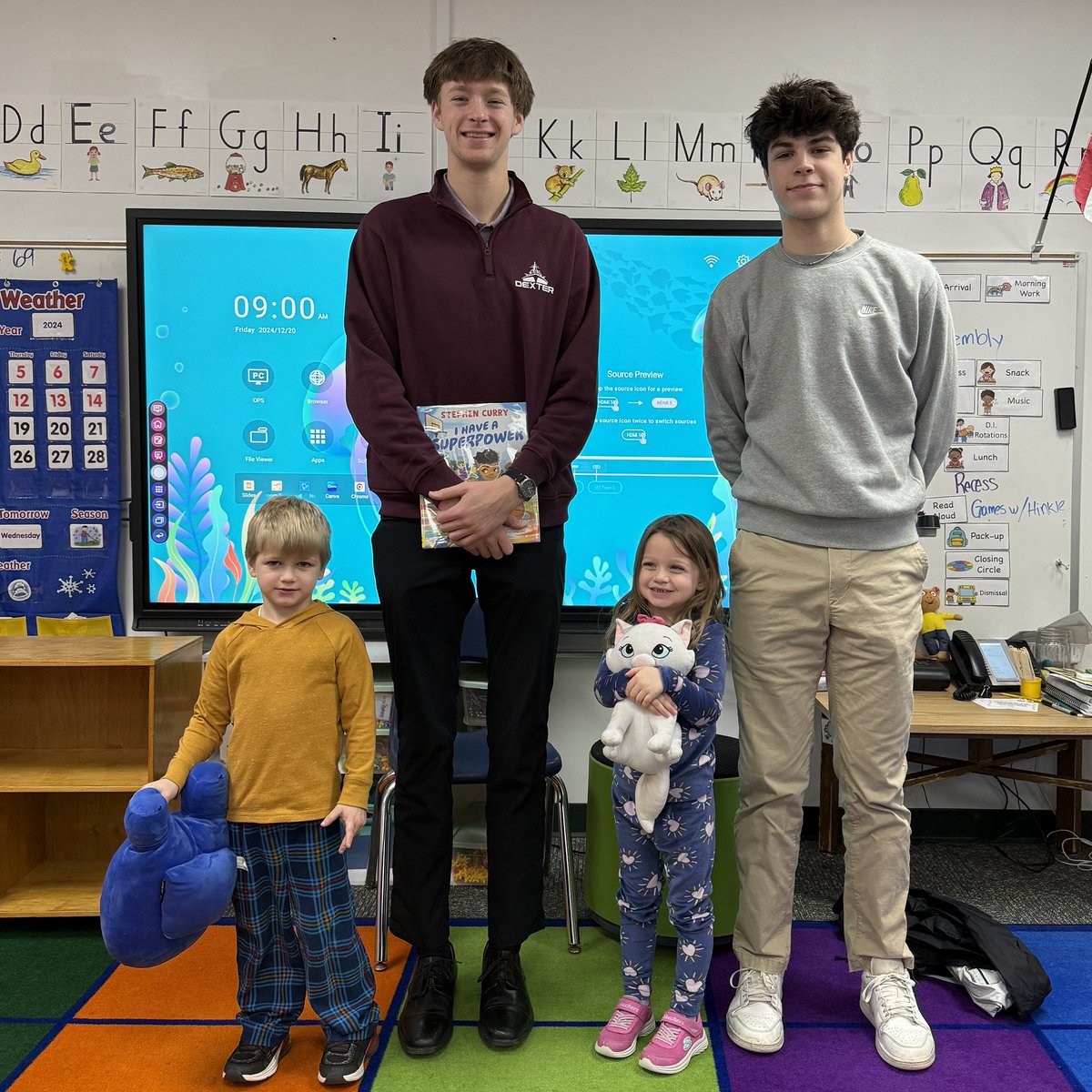 DreadStrong's tweet photo. Mystery readers who are double the size are double the fun for our K-2 classes today! Our varsity boys basketball team read them a book written by NBA player Steph Curry and also invited them all to the doubleheader against Chelsea tonight at DHS! 🏀🏀 #BeatChelsea https://t.co/pi8tJF3UtH