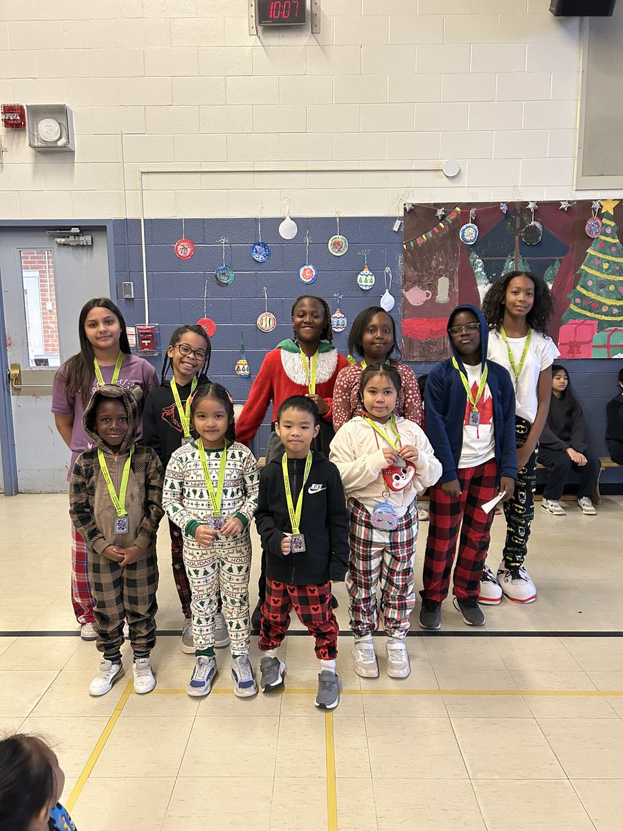 Proudly wearing their medals!  Congratulations to our Catholic Graduate expectation recipients - our Caring Family Members! <a href="/ms_musc/">Giovanna</a> <a href="/TCDSB/">Toronto Catholic District School Board</a>_PAguiar @TCDSB