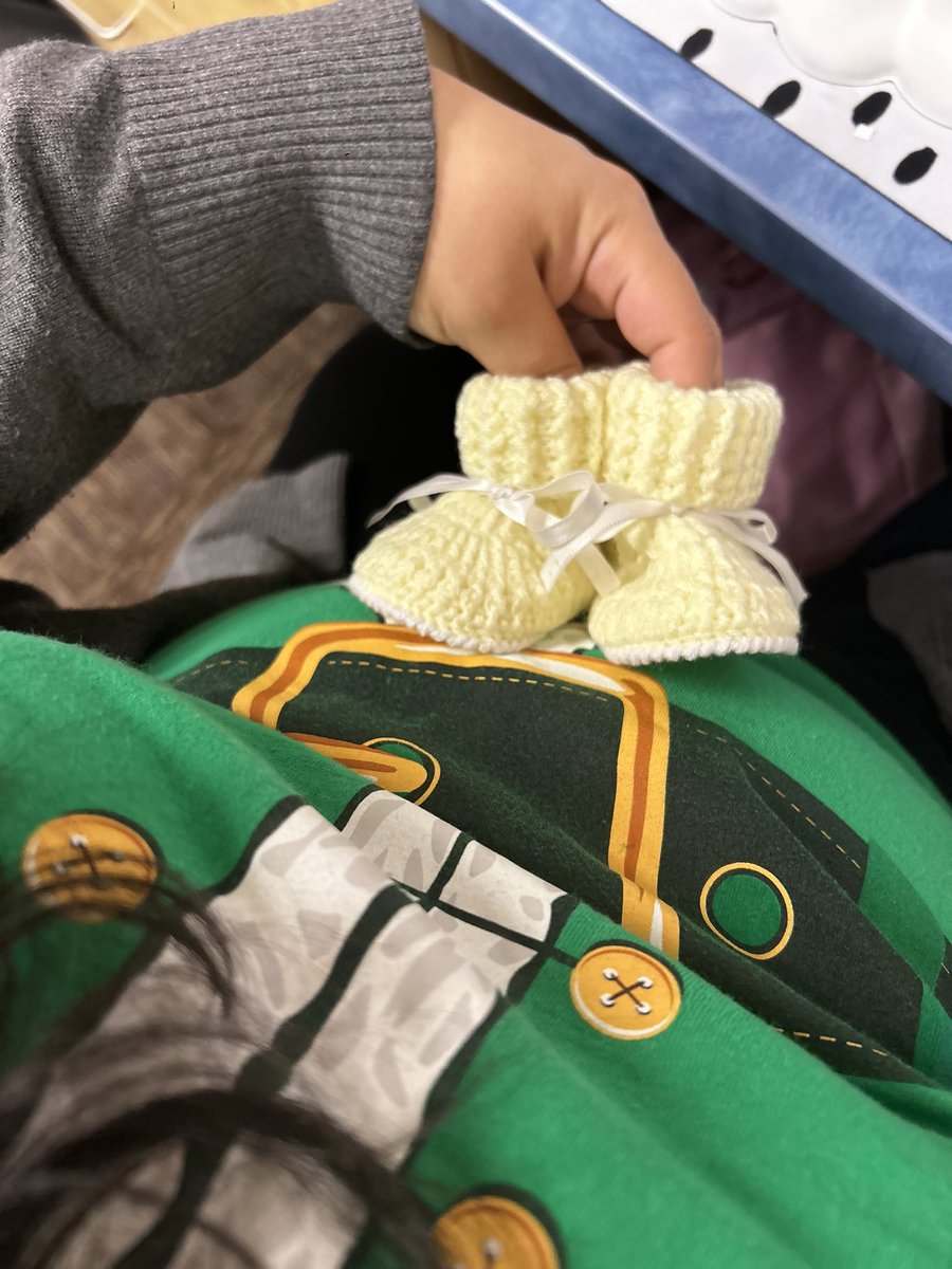 My coworkers are the best, baby’s first hand-made booties! 💛