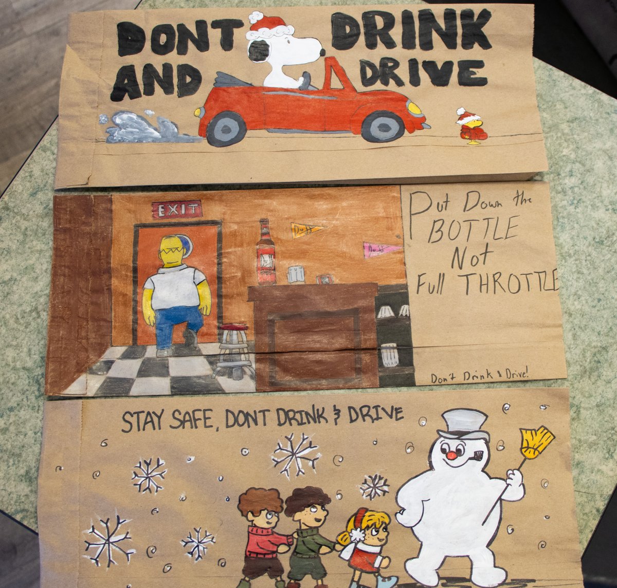 surreyps's tweet image. This holiday season, SPS is teaming up with @ICBC &amp;amp; participating liquor stores in Surrey to distribute Think of Me bags! These brown bags with illustrations by young students encourage drivers to plan ahead for a safe ride home. #GetHomeSafeBC @roadsafetyjo