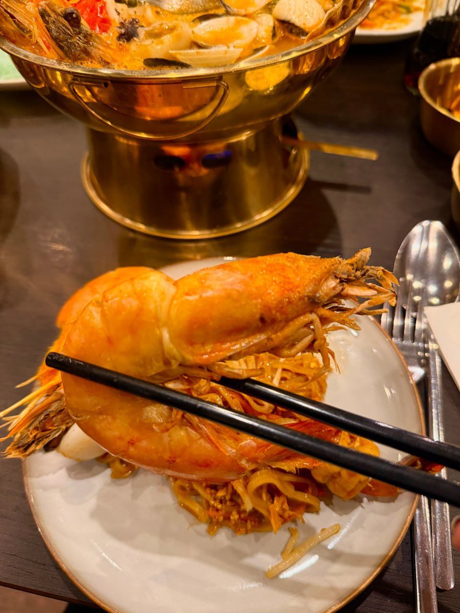 Super-large Tom Yum seafood hot pot, enough for at least me and Mira the prawns are bigger than my palm,