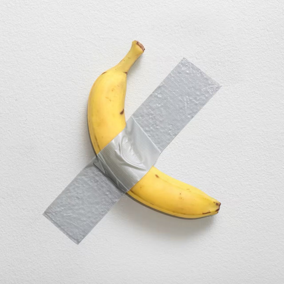 PopBase's tweet photo. A banana duct-taped to a wall recently sold for $6.2 million at an auction in New York. 

The buyer then ate it shortly after. https://t.co/c9hSb5nLOf