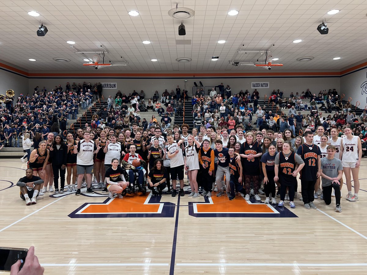RaiderUpdates's tweet photo. I love this picture every year!  Cross town rivals where the action can be intense, but everyone comes together to support this great cause!  Champions Together - The Inclusion Revolution!  Many memories made tonight! https://t.co/2ZxvFcZQdK