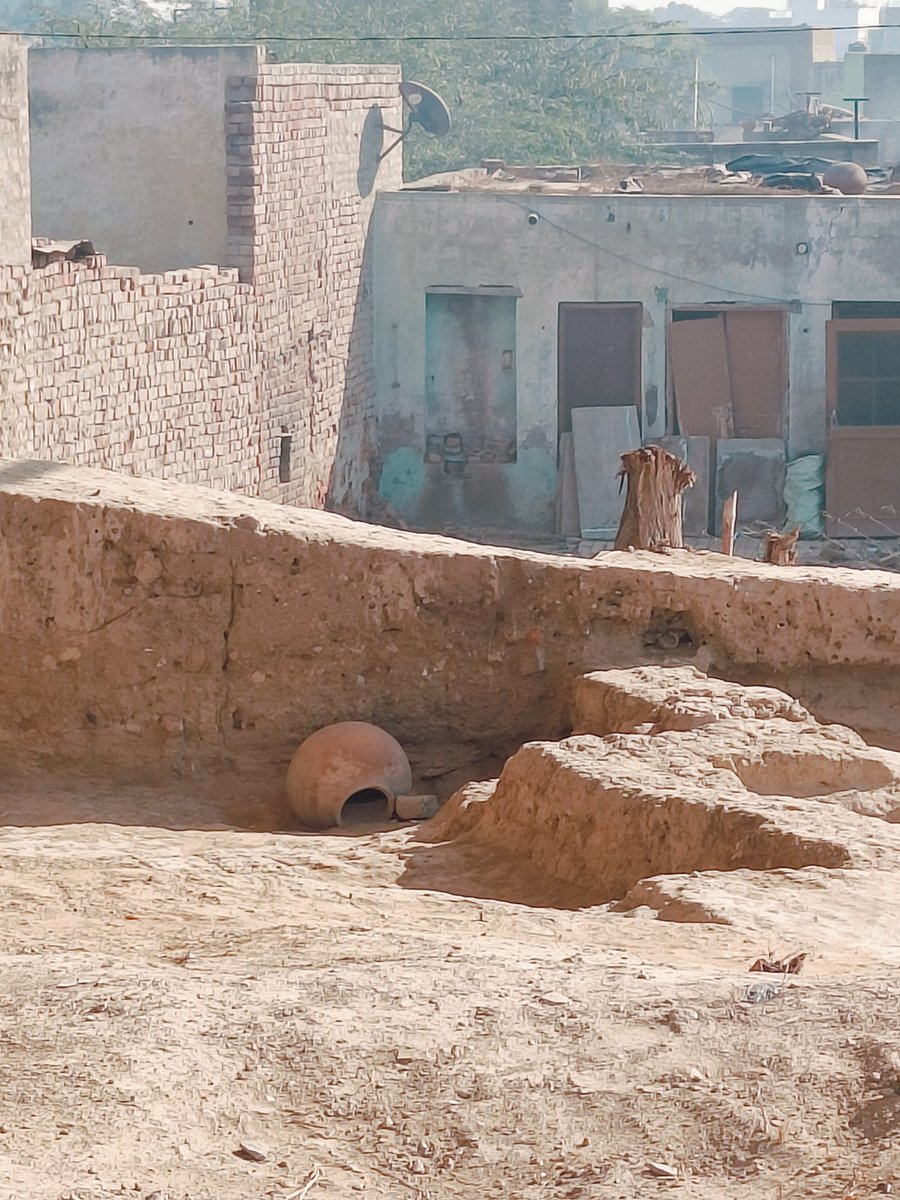 Almost 9000 years apart. The excavation site at Rakhigarhi sits just a few metres from a modern village house. This village has been occupied continuously since at least 7000 BCE.