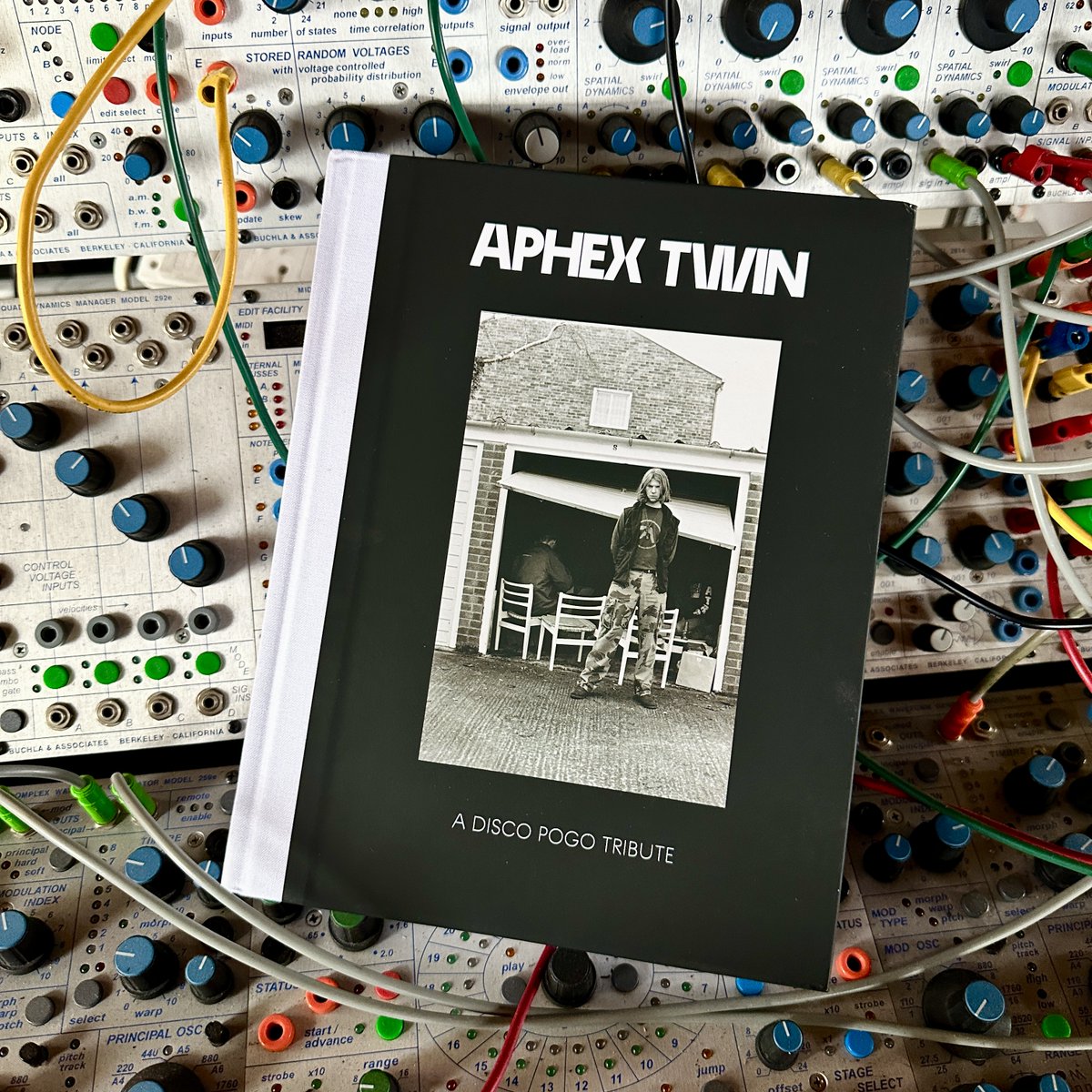 From Cornish Acid to the World - A big fat book on <a href="/AphexTwin/">Aphex Twin</a> sitting on top of one of his old synths. Thanks <a href="/DiscoxPogo/">Disco Pogo</a> 

discopogo.ochre.store/merch/466898-a…