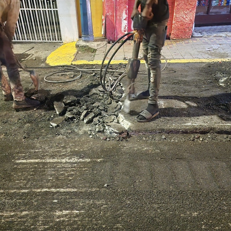 AskSparkjamaica's tweet photo. #REACH is coming to town! 🎄 🚧 With the MHPM's announcement that road repairs are to continue into the Christmas season, work continued last night on Grant's Pen Road with preparation being done for patching. #REACHProgramme #AskSParkJA @nestaja
