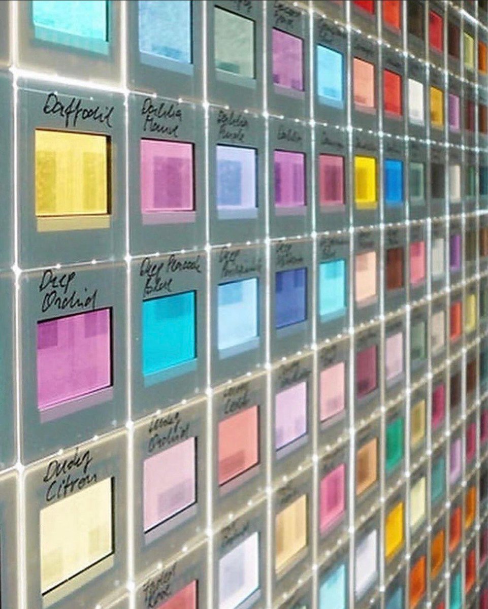 dearvotion's tweet image. Stained glass door made of hundreds of pantone swatches by Italian architect Armin Blasbichler.