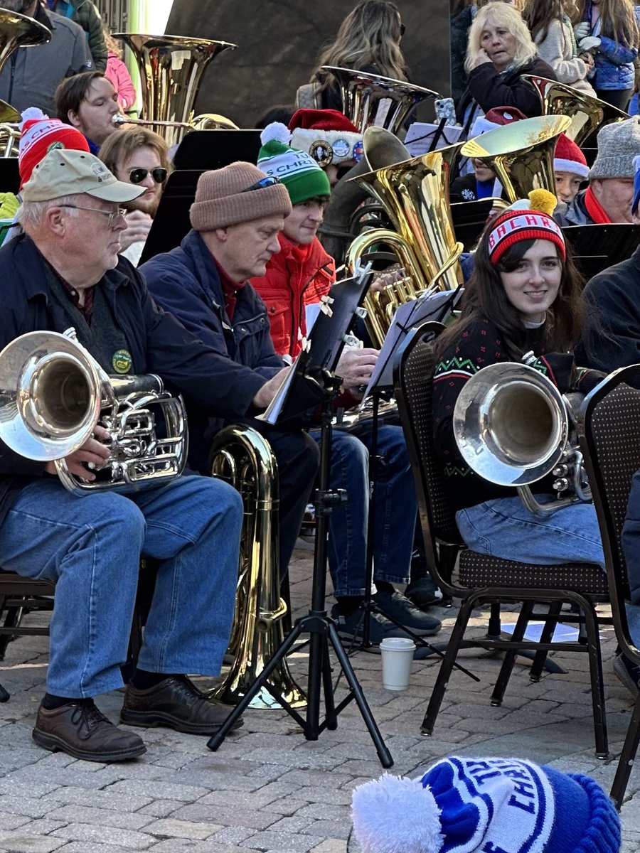 FurmanNews's tweet photo. Christmas hit all the low notes today at the #tubachristmas concert in downtown @CityGreenville. Dr Mark Britt, music prof @FurmanU, led 81 tuba, euphonium & sousaphone players, including many @Furman_Alumni in some deeply moving music. #yeahthatgreenville https://t.co/CfLD4IUtnO