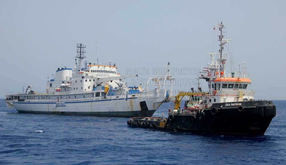 Shipguru's tweet photo. #SingaporeBuilt #offshoretug #SEA_PATRON #towing the #deadship #cablelayer #CERTA #leaving #grandharbourmalta - 08.07.2014 - https://t.co/nfgboxcB5B - NO PHOTOS can be used or manipulated without our permission @TUGSPOTTERS @worldshipsoc @Rich_Ships @ShipsInPics @ShippingMag https://t.co/VQ67LvjiM8