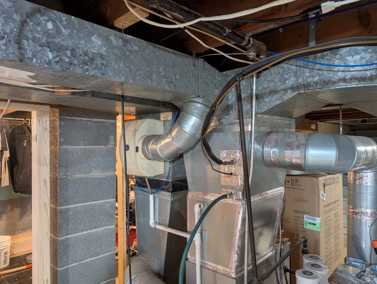 RezAdventure's tweet photo. Electricity is $$ in this region, so I want to switch the water heater to gas, be able to run a gas dryer, and eventually have a gas stove. That means I need to snake a gas line around the furnace and across the room. I've never worked with black pipe before, so here goes nothing https://t.co/4wqVanAxs0