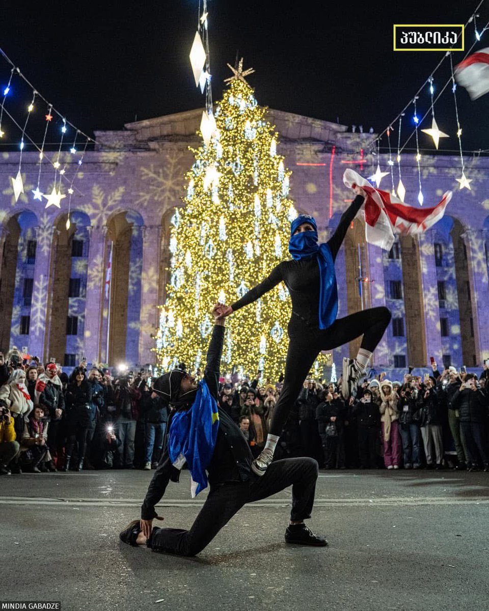 achkhikvadze's tweet photo. The whole country knows where they will celebrate the New Year’s Eve. 

Georgian dancers dance Khorumi, a war dance, as they marched down the Rustaveli Avenue. 
Photo by Minda Gabadze. https://t.co/WRzqBFtWZ6