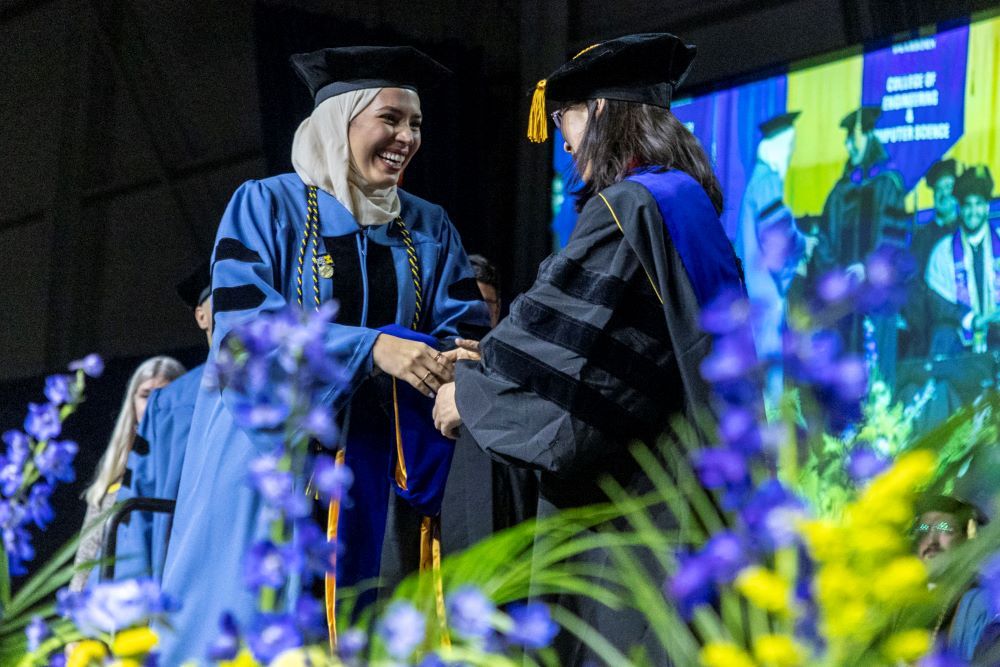 UM_Dearborn's tweet photo. Check out more a-maize-ing photos from the afternoon commencement ceremony! ππ #UMDearbornGrad #Classof2024 https://t.co/MKumySELBd