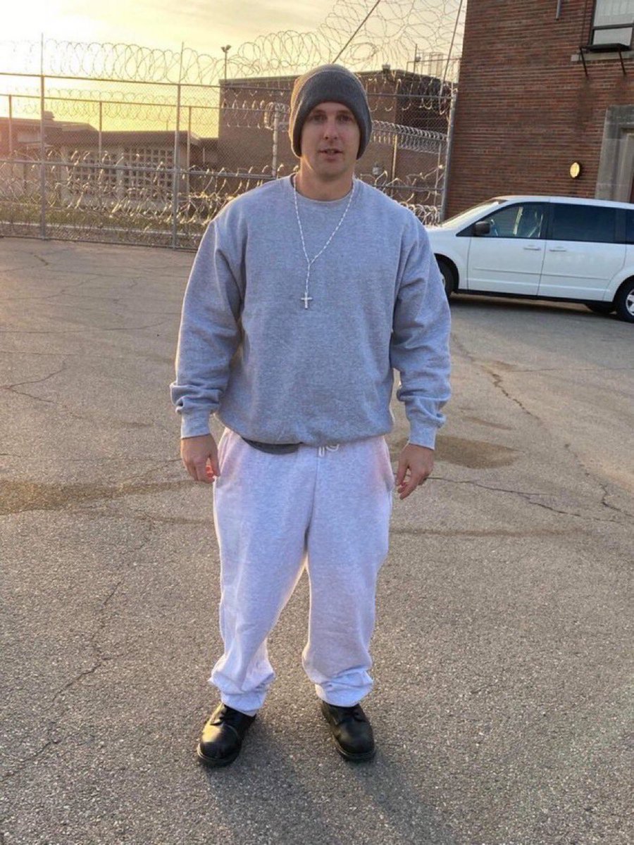 DerrickEvans4WV's tweet photo. I’m the ONLY elected Republican legislator in the country arrested for Jan 6th.

Still wearing my prison clothes &amp; in the prison parking lot, I took this pic when I was released.

In addition to pardons, do you support financial compensation for myself &amp; my fellow J6 prisoners? https://t.co/VTtANEUCpj