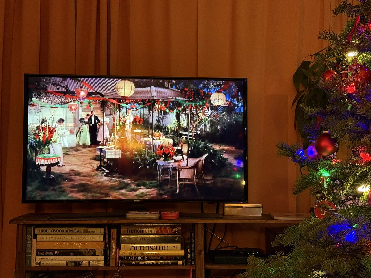 Condimentgrrl's tweet photo. The tree and @tcm after a lovely night with extended family makes the perfect holiday season. #TCMParty #WereNoAngels https://t.co/E5nWf0FMZQ