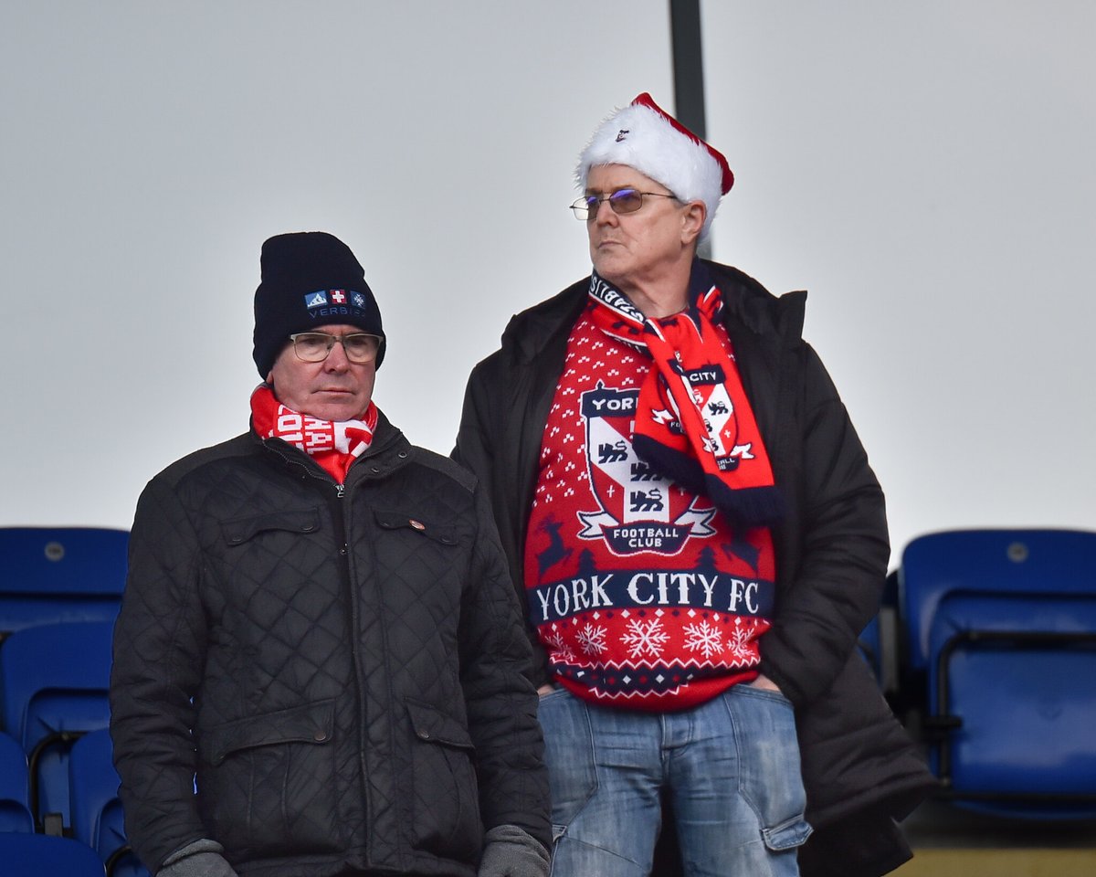 YorkCityFC's tweet photo. 🎅 Festive fever reached the LNER yesterday.

It was great to see you all wearing your Christmas jumpers!

#YCFC 🔴🔵 https://t.co/RKIi48XOm3