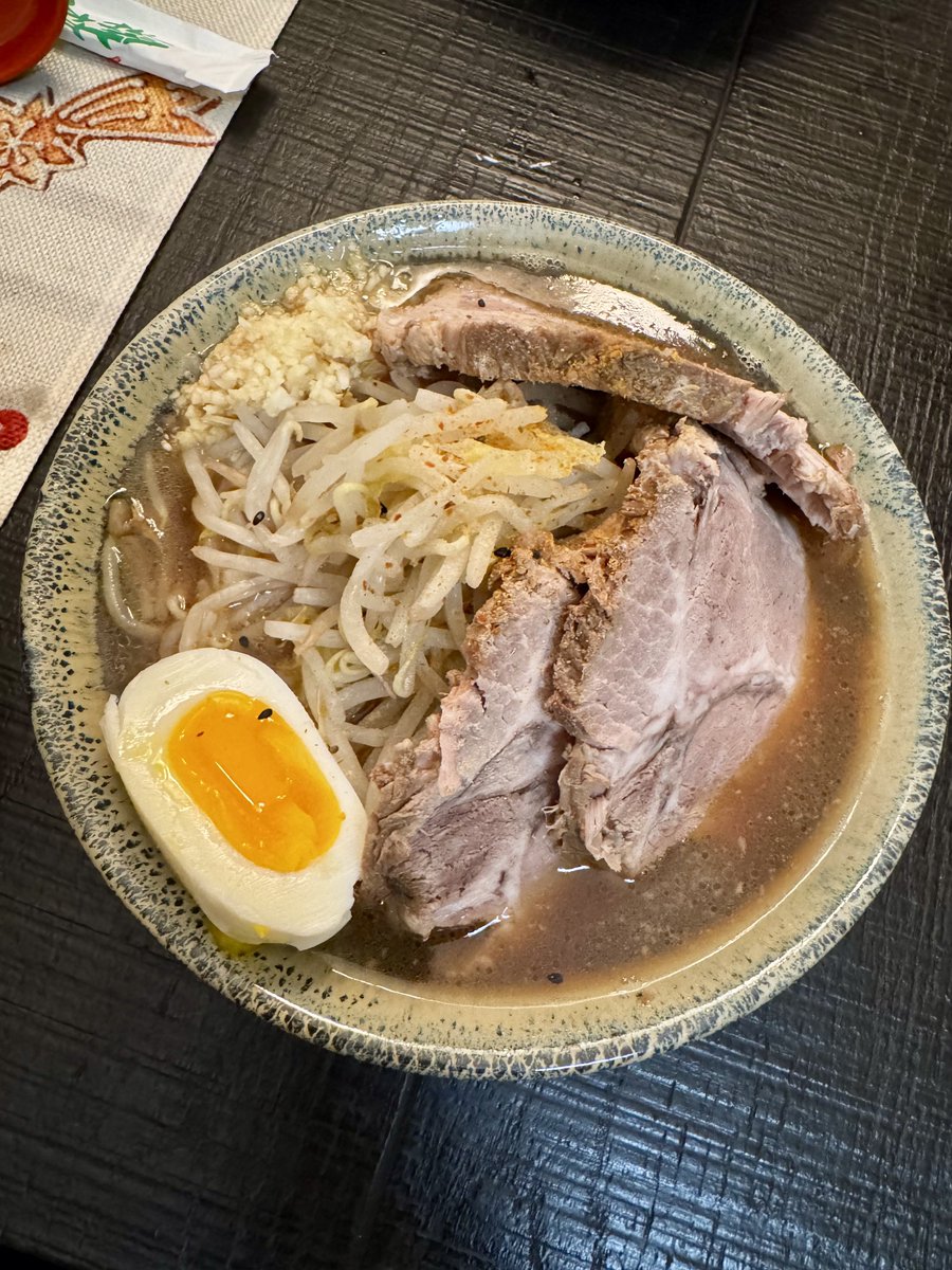 twiliramen's tweet photo. Jiro kei Ramen - You have a bunch of leftover pork bone soup from Iekei, you made too much pork shoulder… what do you do with it? You buy some bean sprouts, cabbage, garlic, and make yourself a jiro ramen. 
2nd time making Jiro ramen. For those who don’t know, Jiro Ramen has a cult-like following in Japan. Some people eat this bowl everyday. It’s cheap and delicious. I’ve been craving it since the last time I made it and man, why is it so good? 
Everything came out great. It’s porky, salty from the extra use of tare, and garlicky. I just didn’t have seabura on hand, but the bowl was still great. I NEED to learn to cut the dough sheet way thicker next time to get those crazy reverse cut noodles when I make this. I keep underestimating that part of it. Ramen is a trial and error / learning experience and I deeply enjoy making different styles so I can continue to feel more comfortable throwing it together. All in all, a pretty solid bowl for coming up with the idea that afternoon.