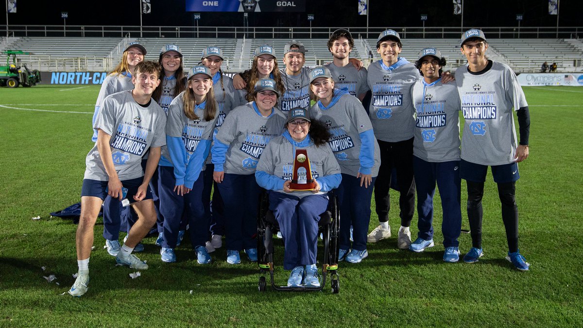 uncwomenssoccer's tweet photo. It takes a village to raise a banner 🏆 

To all of our support staff, pictured here or not, 𝓉𝒽𝒶𝓃𝓀 𝓎𝑜𝓊 – we couldn't have done it without you. https://t.co/fwYfjdCiAP