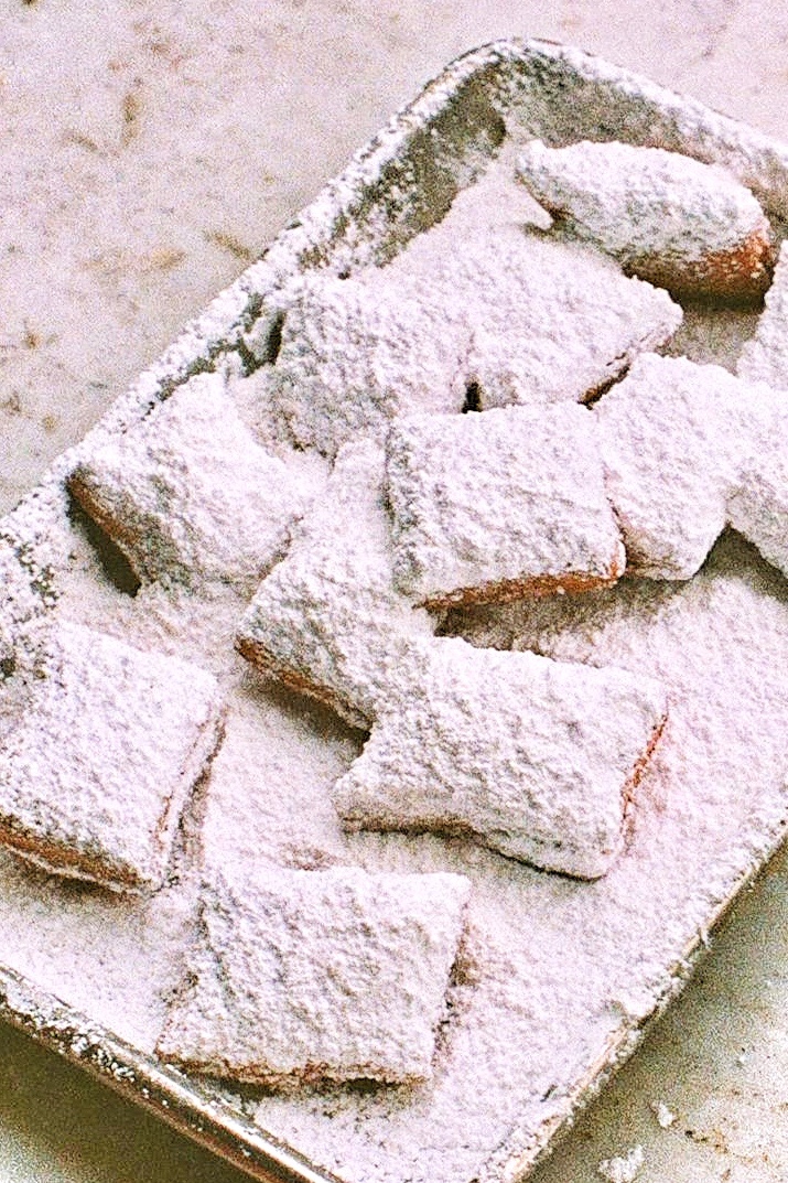 Donald_G_Redman's tweet photo. Beignet “sticks” - a play on traditional beignets. Yummy!
Alphabet Challenge. #WeekYforYummy
Since about the 16th century, beignets have been eaten during Mardi Gras by the French. A beignet is a French-style fried square doughnut.
How did it become an iconic New Orleans dessert?
Introduced in Louisiana by French founders of New Orleans and the French Acadians in the 18th century. (The Acadians - Cajuns - were French Canadians who were forced into exile from Nova Scotia by the British, many of whom settled in southwest Louisiana)
Beignets are commonly served hot with powdered sugar for breakfast or as a dessert. They are made by deep-frying choux pastry dough, which puffs up when cooked. The word beignet loosely translates to “fritter” in English.
The beignet has been described as being similar to funnel cakes and fritters, but not as sweet as a doughnut.
I compare it to Native American/Spanish inspired sopapillas.
In 1862, the iconic New Orleans restaurant, Café du Monde, opened and sold the modern beignet, forever marrying the two. To this day, Café du Monde sells beignets around the clock, all days of the week — and it's the only item the business serves, other than its famous coffee with chicory and hot chocolate.