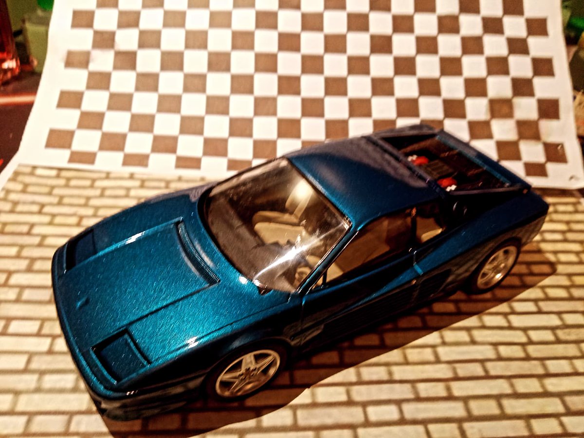 Tamiya Testarossa almost finished. Looks like I'll have to partially disassemble it tomorrow to fix those headlights and rear cowl.