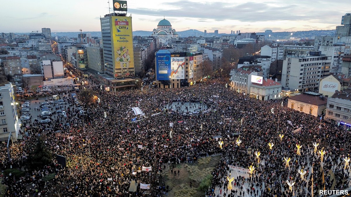 VOANews's tweet photo. 📷: A drone view shows people gathering during a protest against government policies, corruption and the negligence which they blame for the deaths of the victims in the Novi Sad railway station disaster in November, in Belgrade, Serbia, Dec. 22, 2024.

https://t.co/X2K2jiVvyk https://t.co/ix1SjhPWqS