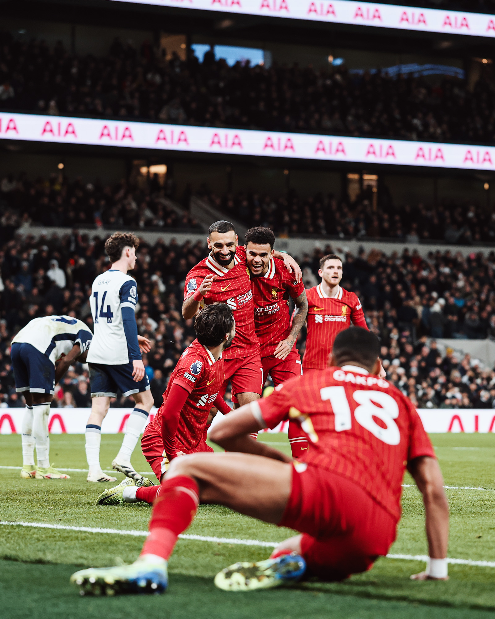 Photography of Mo Salah celebrating a goal against Tottenham.