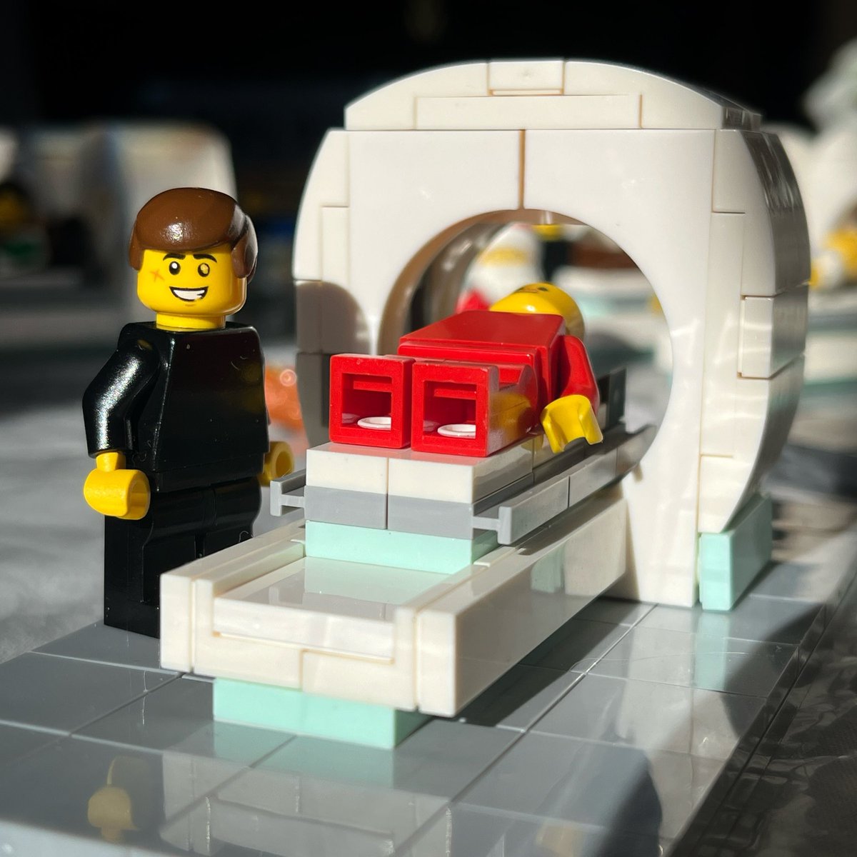 My sister needs to play Santa at work this year, so I helped her out and made Lego gifts of MRI machines complete with a tech and patient.