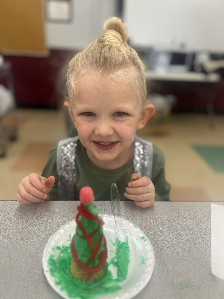 🎄✨ Our Preschool through 2nd-grade students had a blast decorating edible Christmas trees! A huge thank you to our amazing PTO for helping make this festive activity possible.  🍭🎅 We appreciate all you do to support our kids! ❤️ #EdibleTrees #HolidayFun #ThankYouPTO